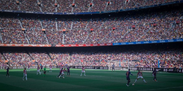 images/players_playing_football_game.jpg